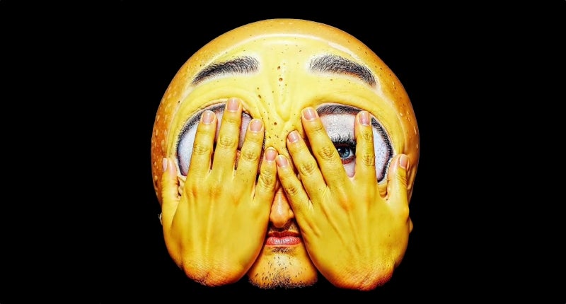 AI enhanced eyes covered emoji